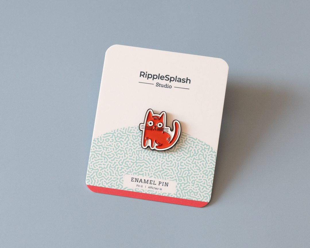 red cat enamel pin on branded backing card