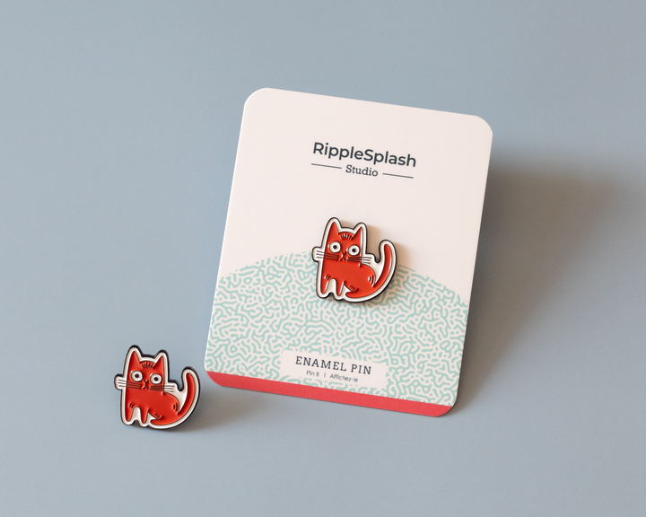 red cat enamel pin on branded backing card
