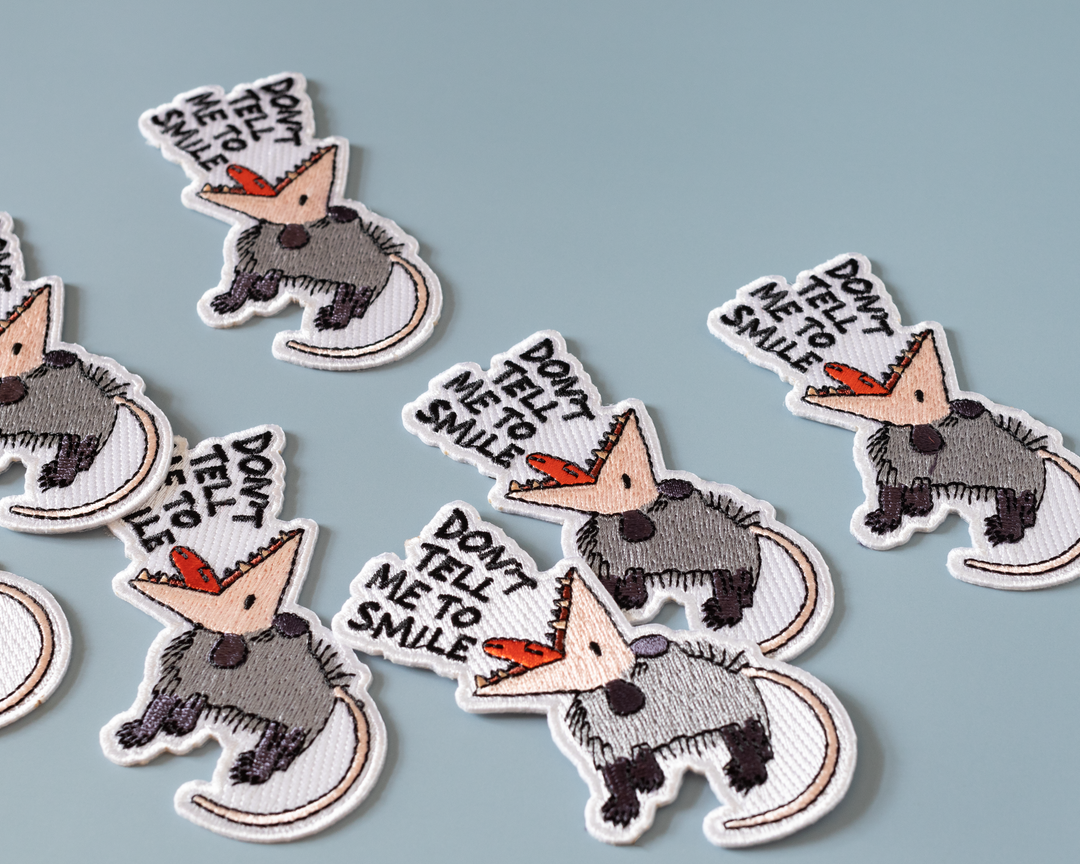 Don't Tell Me to Smile Possum Iron-On Patch