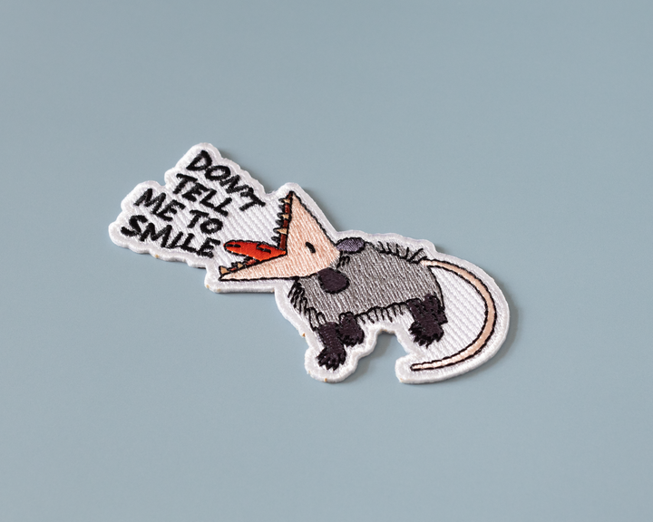 Don't Tell Me to Smile Possum Iron-On Patch